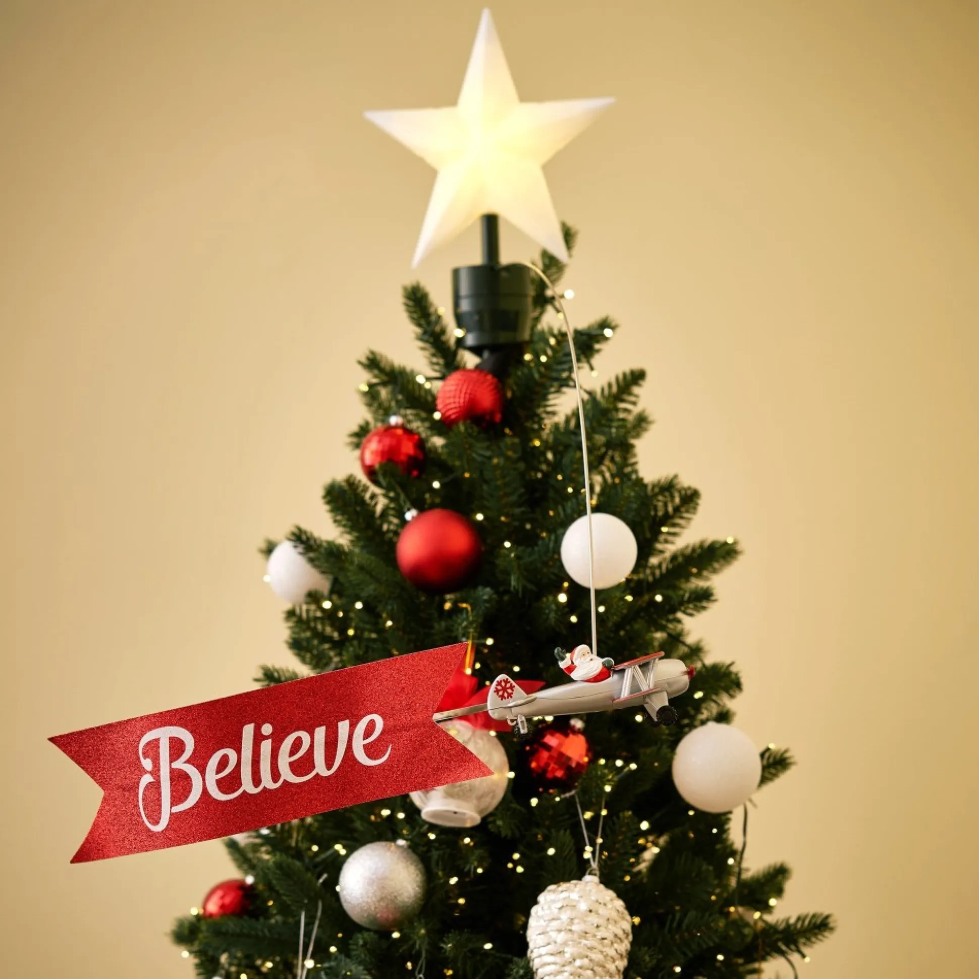 Online Mr. Christmas Animated Biplane Tree Topper With Banner - White Santa